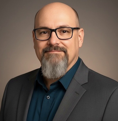 Author headshot of Tom Holden